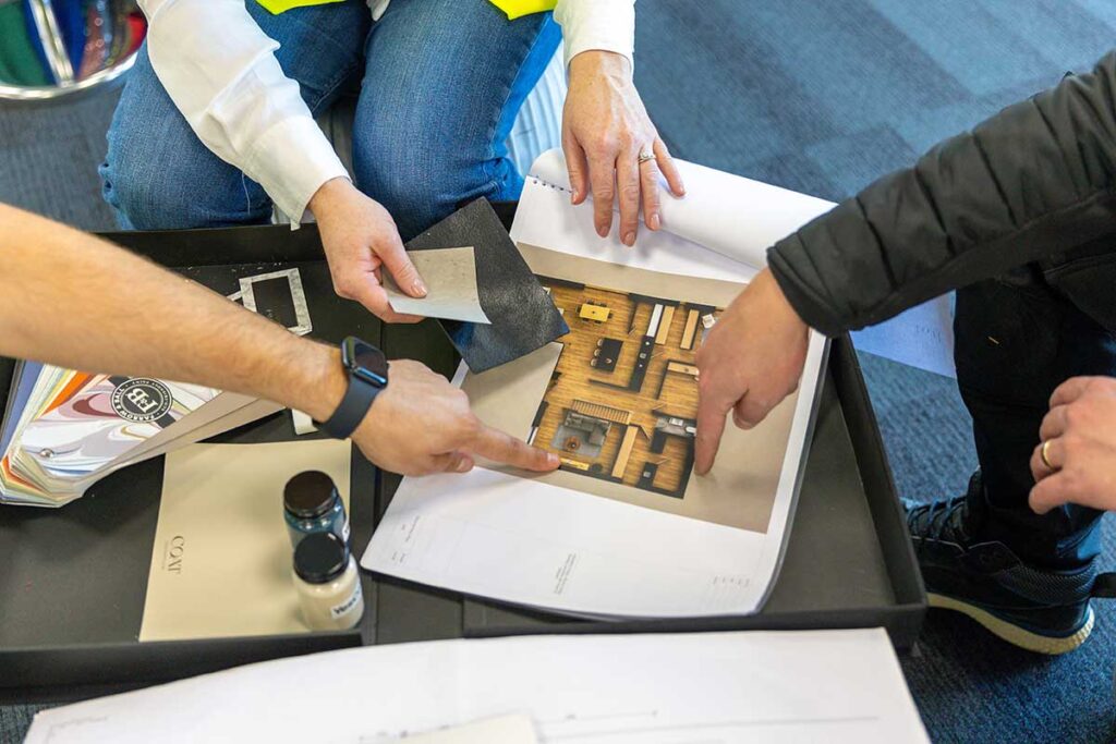 Renovation floor plans, measuring tools and material samples